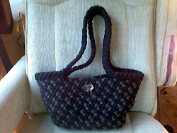 Handmade wool Black braided purse with gold herring bone. Braided handle and zipper pouch inside
