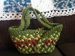 Handmade Wool Green braided purse with braided handle and zipper pouch inside 